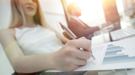 business woman working with financial documents.