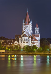 Fototapeta premium Church Heiliger Franz of Assisi, Vienna, Austria. night scene