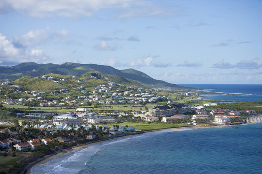 Low aerial view of resorts and beaches in St Kitts.
