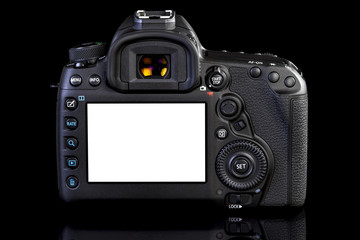 DSLR camera on black glass background
