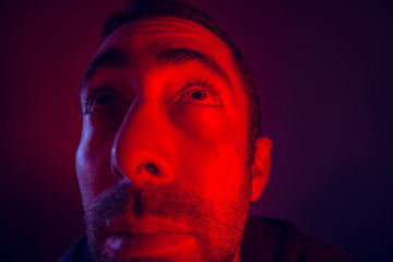 Man with hope facial expression looking up