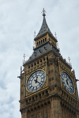 The clock tower of Big Ben in London shows the time of 12:23