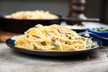 Spaghetti carbonara with egg and pancetta