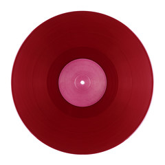 Naklejka premium Red DJ vinyl record plate for a music player on a white background close-up 