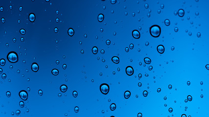 Water Drops On Blue Glass