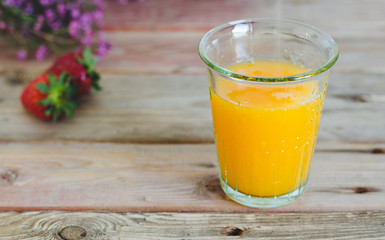 Glass of orange juice freshly squeezed.