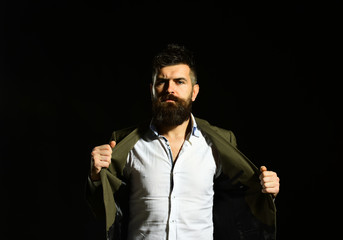 Confidence and elegance concept. Businessman with beard and spiky hair