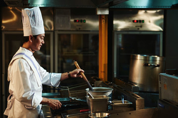 Master chef making soup
