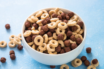 Healthy cereal breakfast on blue. 