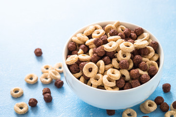 Healthy cereal breakfast on blue. 
