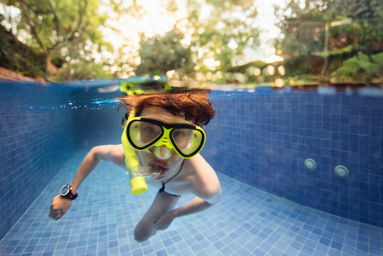 Split image of a boy with snorkel and mask in a swimming pool