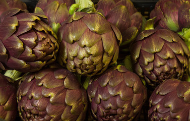 Fototapeta premium pile of purple artichokes