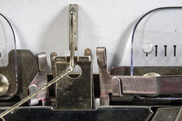 Typewriter shown in macro technology. A mechanical device for printing text.