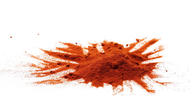Pile of red paprika powder isolated on white, with clipping path