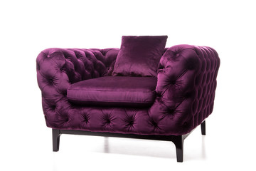 Retro style armchair,old styled dark purple vintage armchair isolated on white background