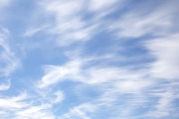 White clouds in the blue sky.