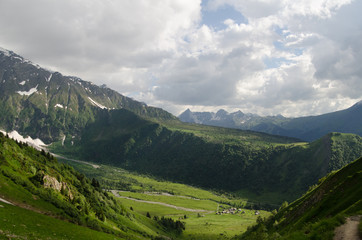 Fototapeta na wymiar Grassy Alpine mountain landscape