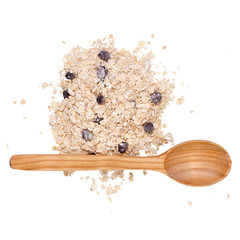 Porridge oat flakes with blueberries wooden spoon