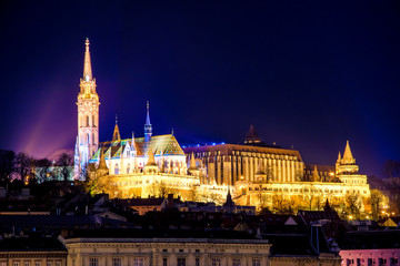 Night view of illuminated Budapest with Saint Matthias church and fishermen towers, Hungary.