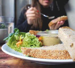 Beautiful portion of hummus and salad
