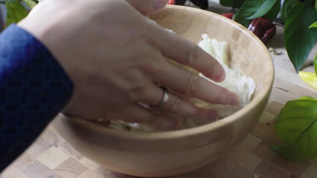 wrinsing a nappa cabbage for cooking