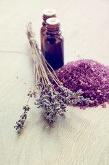 Obraz na płótnie Canvas Spa still-life with lavender and bottles of essential oils