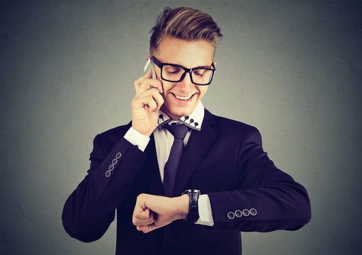 Successful young businessman having call