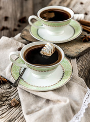 two cups of black coffee