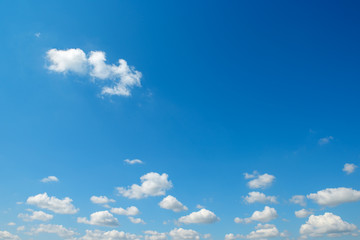 Small white clouds against the blue sky.