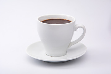 Obraz premium Hot chocolate drink in white cup isolated on white background, food concept