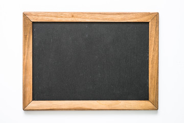 Vintage chalkboard in wooden frame on white background. 