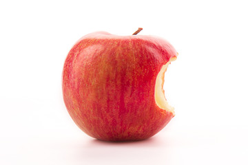 Bitten red apple on a white background.
