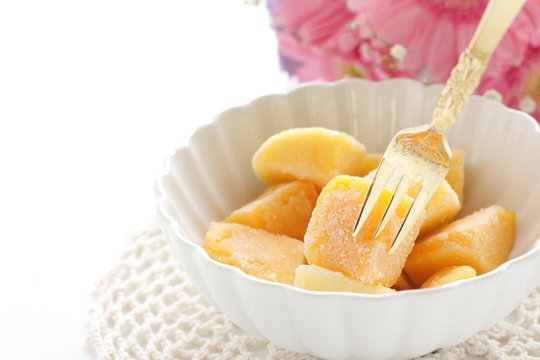 Frozen mango on white background for dessert image