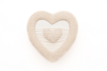 Casket in the form of heart on a white background.