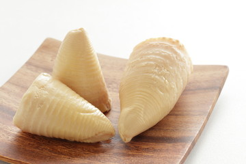 Boiled Bamboo shoot on wooden plate for spring food ingredient
