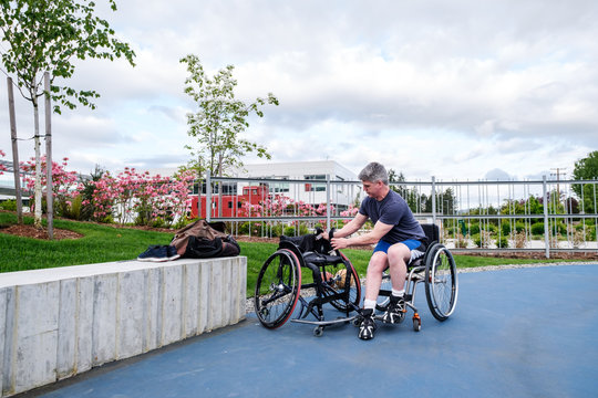 Active Disabled Athlete Getting Ready for Wheelchair Basketball
