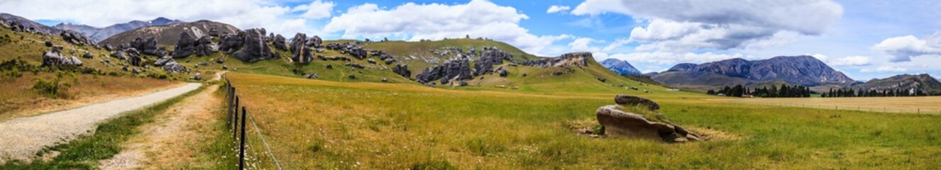 Fototapeta na wymiar Top Tourist attractions and activities, Majestic Castle Hill Panoramic Limestone Formation Boulders Landscape View, South Island, New Zealand. It is located between Darfield and Arthur's Pass.