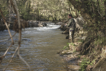 sport fisherman in river, Galicia, Spain.