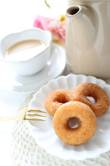 Homemade sugar donut and tea