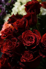 Bouquet of red roses arranged in vase in flower shop