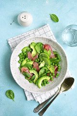 Green vegetable salad with salted salmon.Top view.