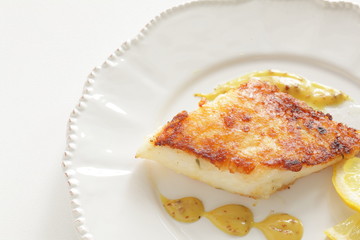 Homemade french style White fish sauteed with mustard sauce