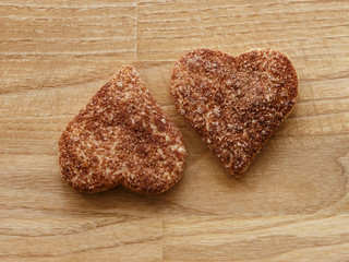 cinnamon hearts cookies wood texture