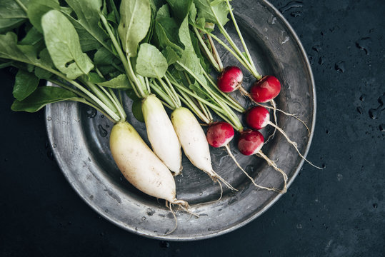 Food: icicles and red radish on a plate