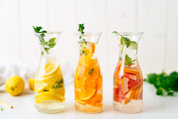 Summer drink: refreshing raw citrus fruits infused water