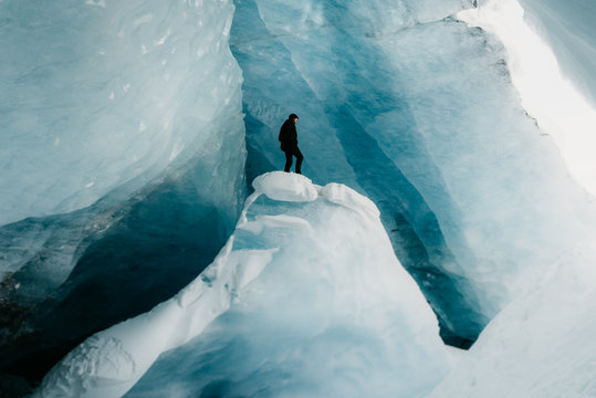 Man walking on glacier