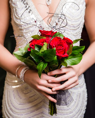 Teen girl holds rose bouquet © Mary Perry