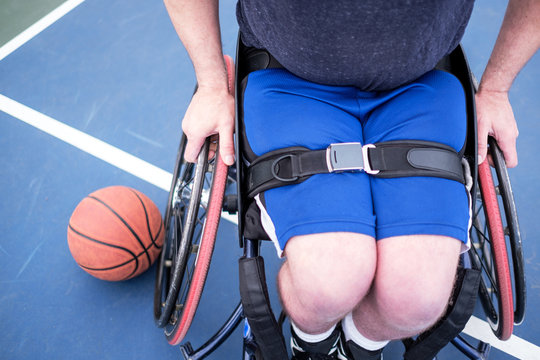Active Disabled Athlete Practicing Wheelchair Basketball
