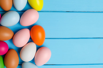 easter eggs on blue wooden background