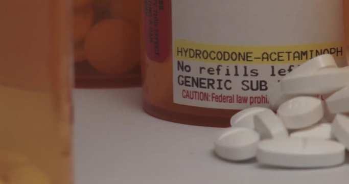 Hydrocodone Pills And Prescription Bottles - Pan